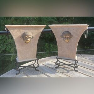 2 Crackled beige pedestal planters with gold monkey face